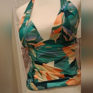 Swim suit brand new, never worn, slightly padded, but not too much. Very tums!